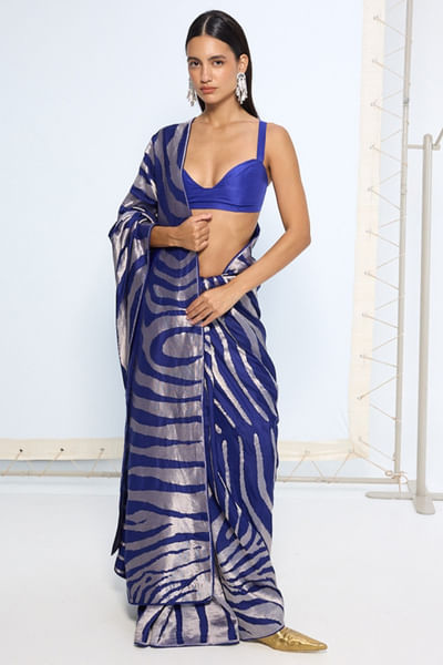 Dark blue and silver animal print zari sari