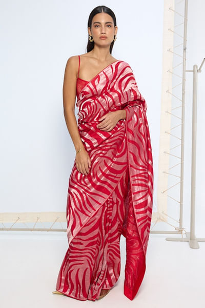 Red animal print zari weave sari