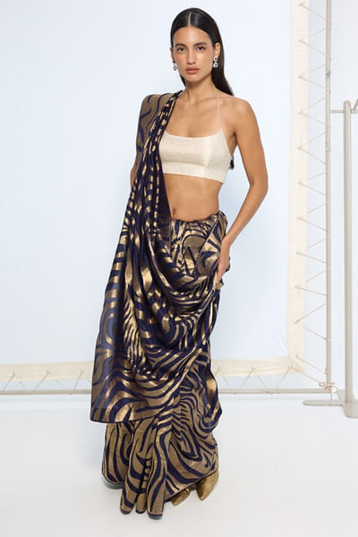 Black and gold animal print zari weave sari