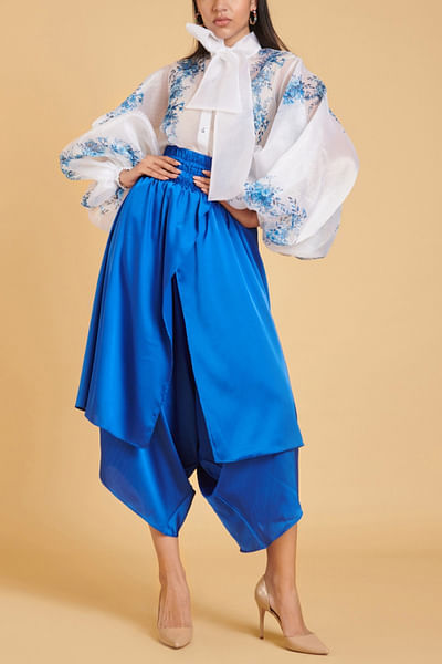 Ivory shirt and blue pants