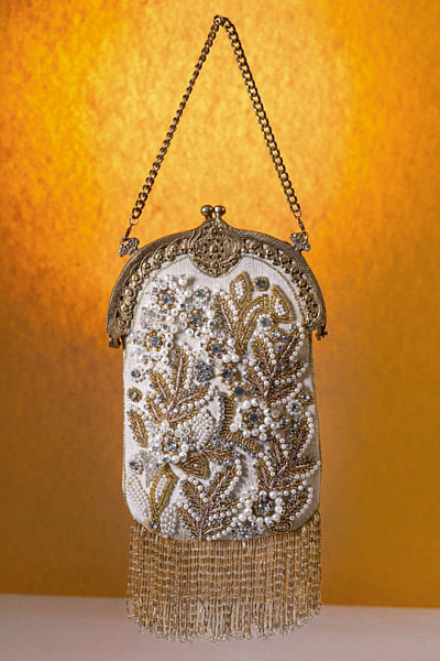 White floral embroidered tassel potli bag