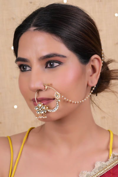 White kundan embellished nose ring