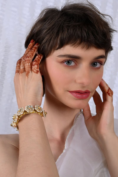 Pink kundan embellished pochi bangle
