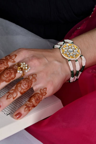 White kundan and stone embellished bracelet