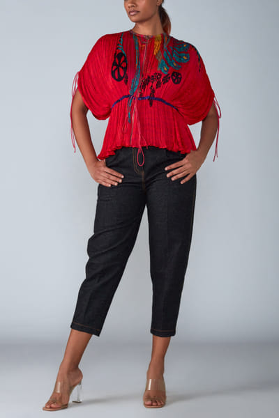 Printed kaftan blouse and jeans