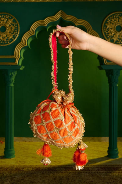 Deep orange gota embroidered potli bag