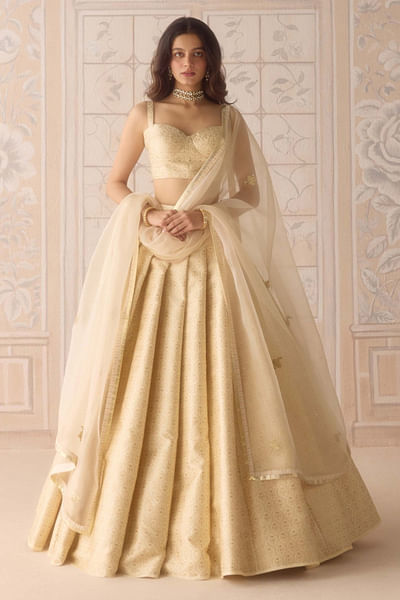 Ivory brocade pleated lehenga set