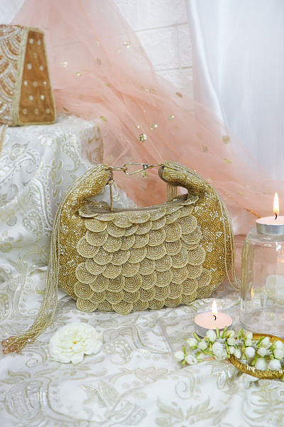 Gold bead embellished handbag