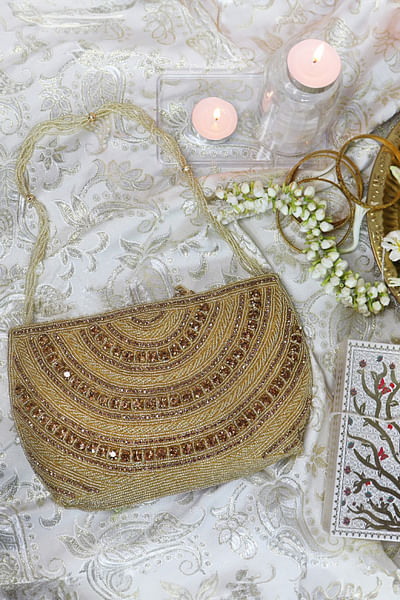 Gold embellished handbag