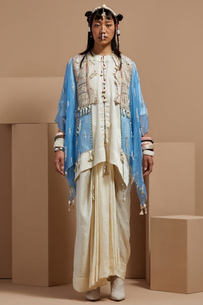 Sky blue tasselled cape and pleated skirt set