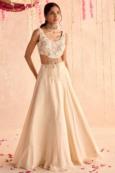 Ivory embellished blouse and lehenga