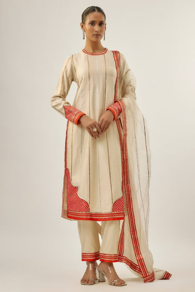 Ivory and orange embellished kurta set
