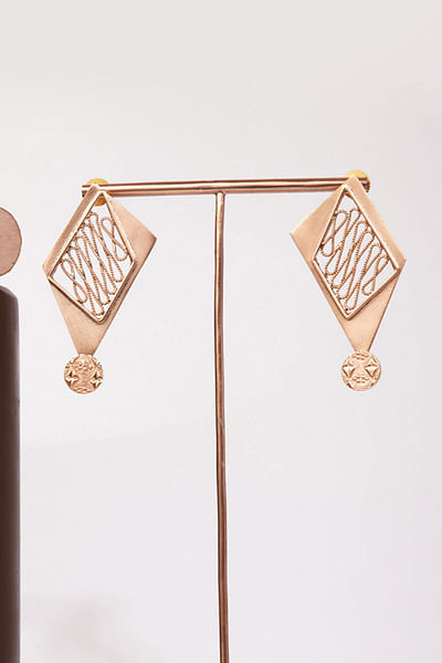 Gold kite-shaped studs