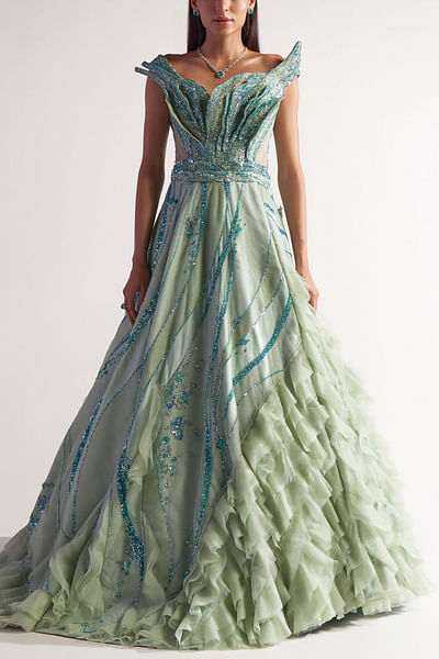 Asymmetrical ruffled tulle gown