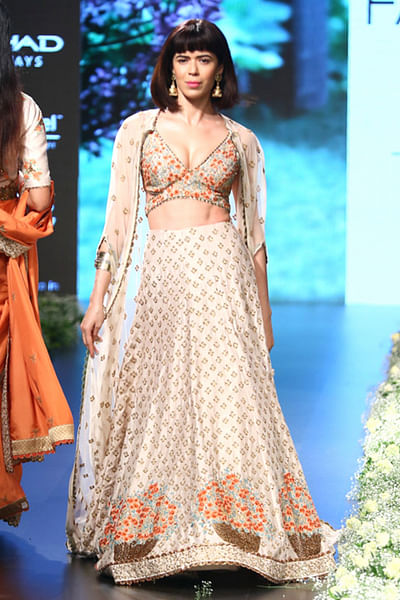 Embroidered lehenga, blouse and net cape