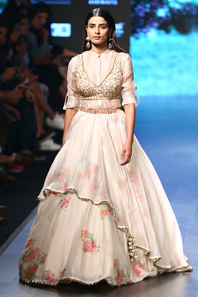Layered lehenga with organza top and embroidered bustier