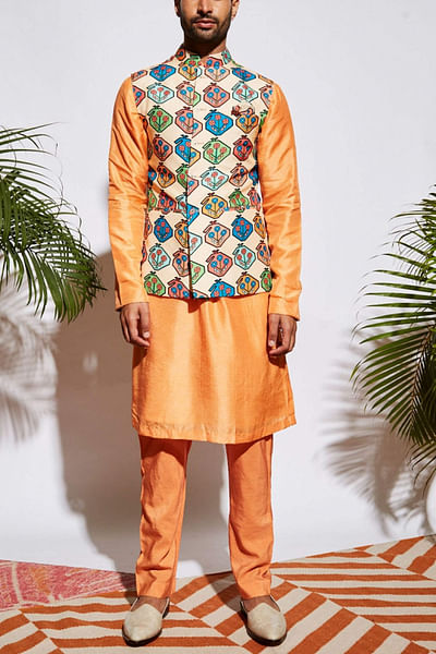 Orange kurta and printed bandi set