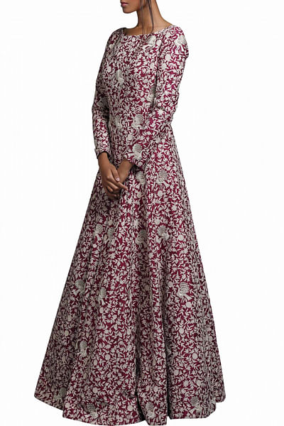 Beetroot embellished gown with peacock motifs