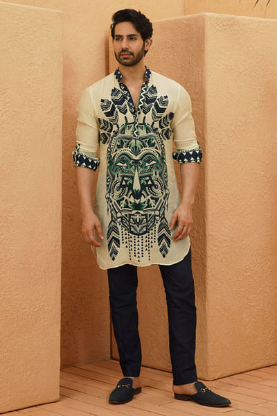 Ivory geometric and tribal mask printed kurta