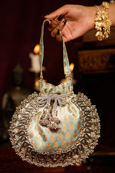 Light blue peacock beaded-tasselled potli bag
