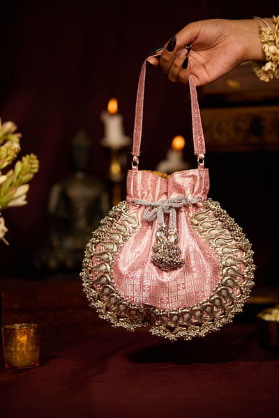Pink peacock-beaded and tasselled potli bag