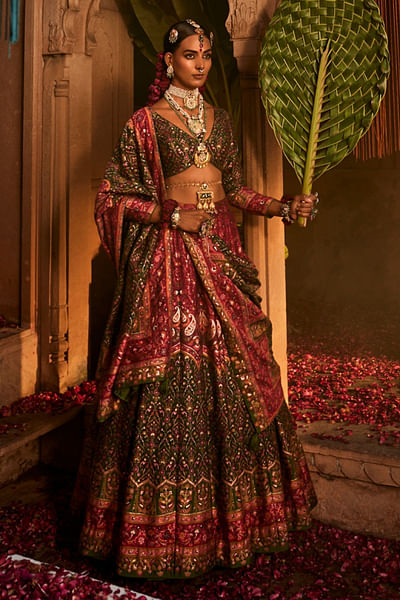 Green and magenta floral woven lehenga set