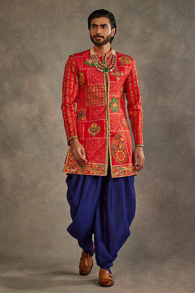 Red embroidered sherwani and dhoti pant set