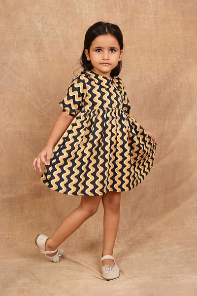Black and mustard wavy print dress
