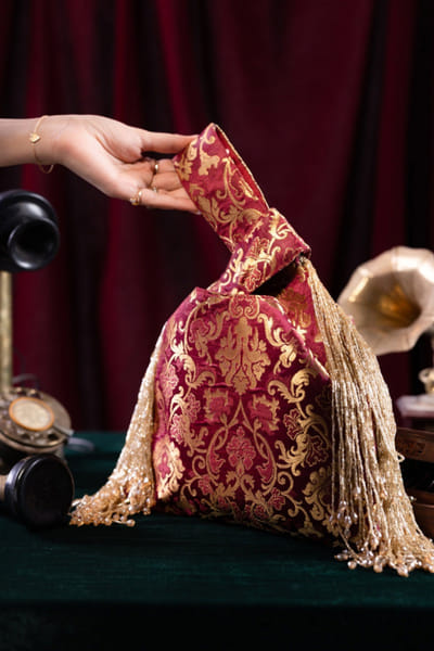 Be Chic Maroon brocade potli bag BECHJUL26D150889