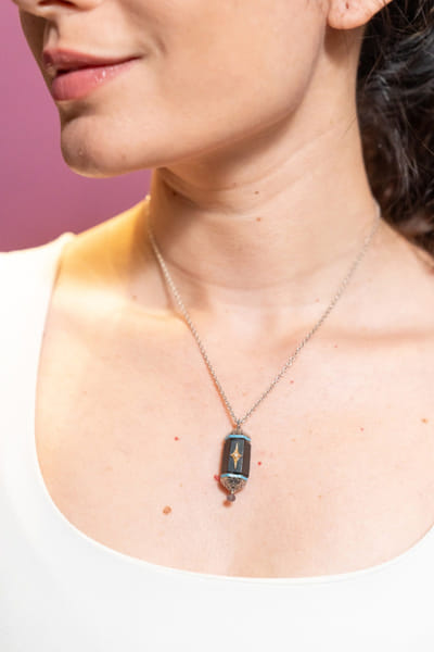 Uncut by Aditi Amin Black and blue embellished pendant necklace UNCUJUN26D146771