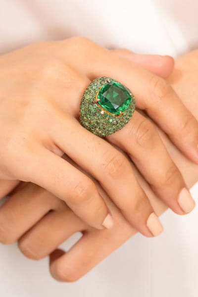 Gold and emerald stone embellished ring