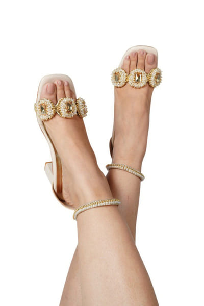 Gold pearl embellished heels