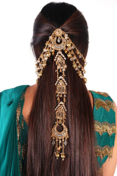 Gold beaded hair accessory
