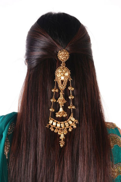 Gold bead embellished hair accessory