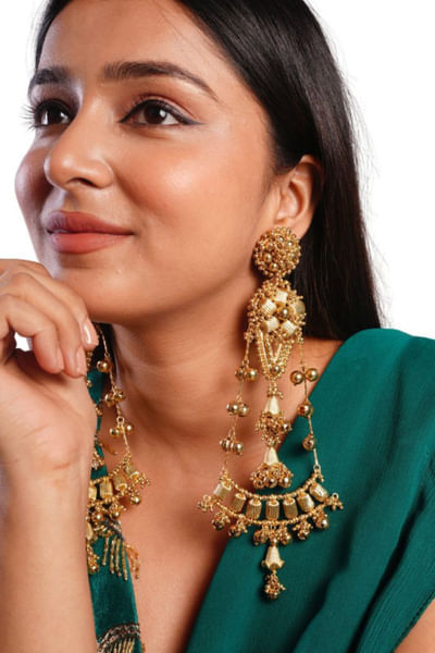 Gold beaded long earrings