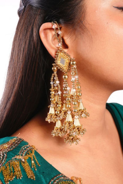 Gold bead-encrusted earrings