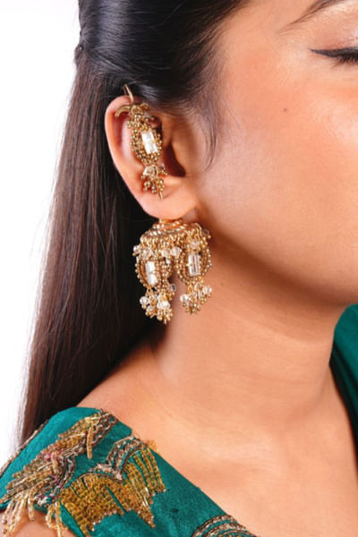Gold finish embellished earrings