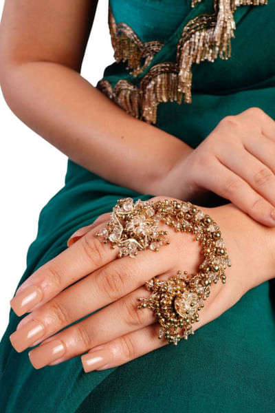 Gold beaded two-finger connected ring