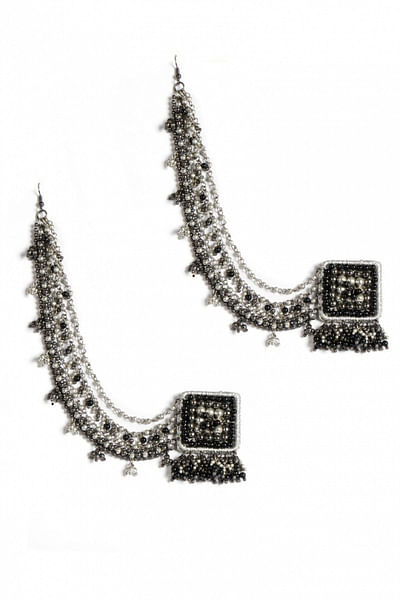 Black stones embellished earrings and chains