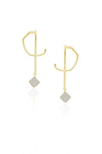 Gold and white earrings