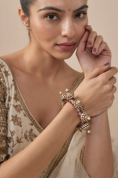 Gold kundan embellished bangles