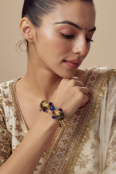 Gold and blue stone embellished kada