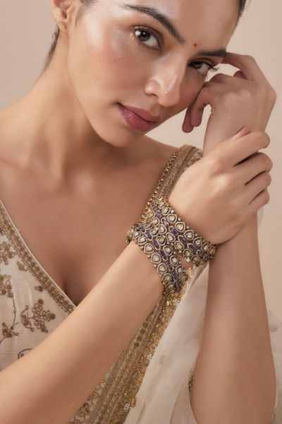Gold and purple stone embellished bangles