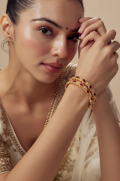 Pink and gold kundan bangles