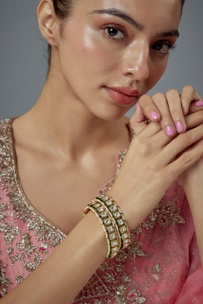 Gold and white kundan polki bangles