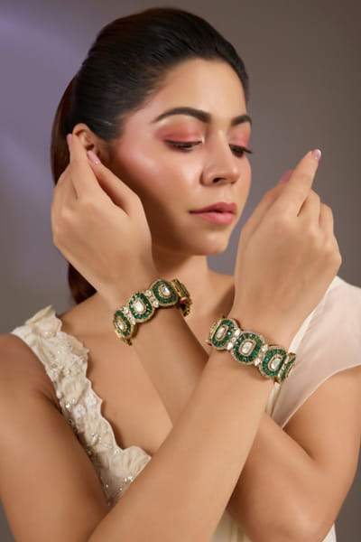 Green stone studded kundan polki bangles