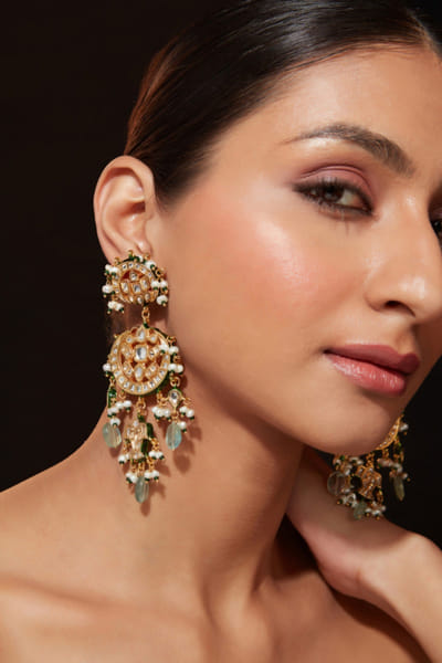 Gold plated green kundan polki earrings