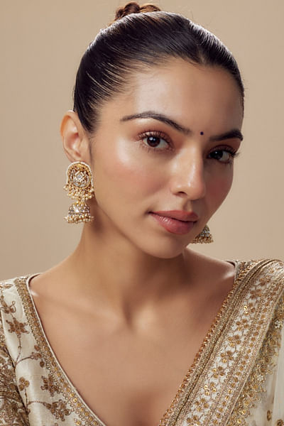 Gold kundan embellished jhumkas