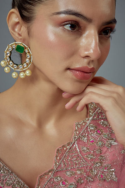Gold and green gemstone kundan earrings