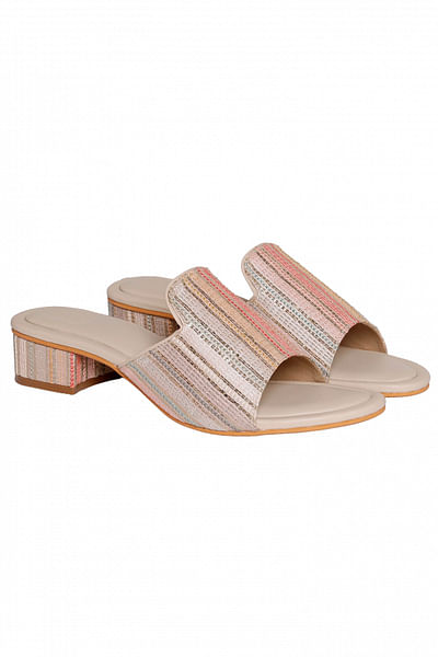 Pink textured slip-on sandals